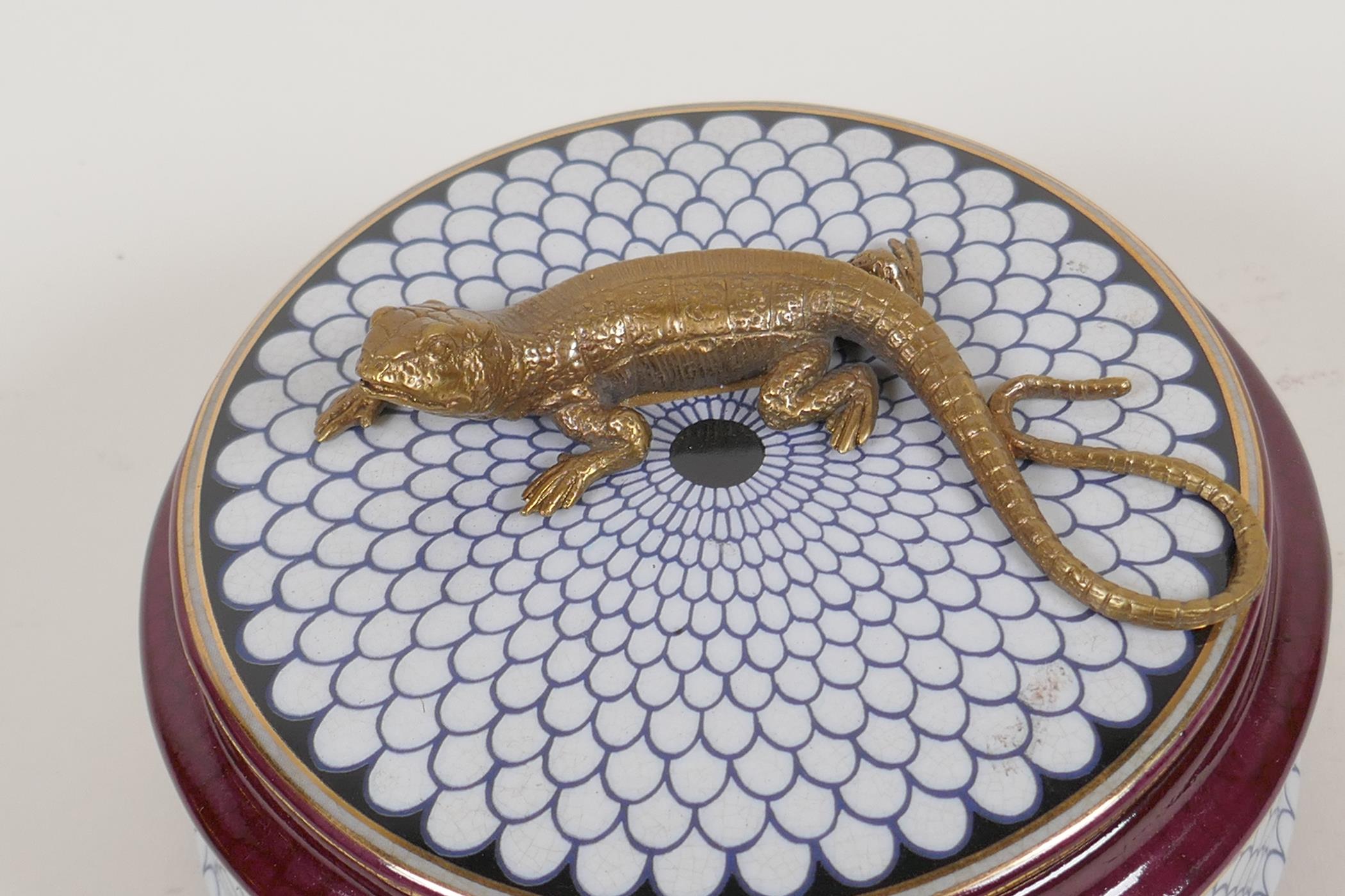 A porcelain trinket box, the cover with a bronzed figure of a lizard, 5½" diameter - Image 3 of 12