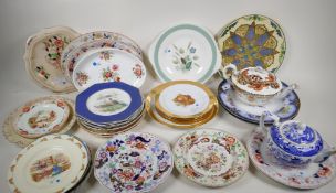 A quantity of decorative pottery and porcelain plates serving dishes and tea pots, to include