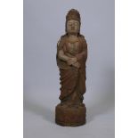 A carved and painted wood figure of Quan Yin, 24" high