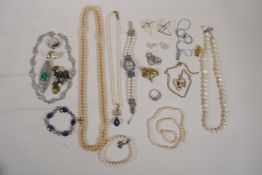 A quantity of assorted costume jewellery including pearl necklaces, earrings, rings etc, many silver