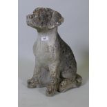 A vintage concrete garden figure of a seated dog, 20" high, one paw AF