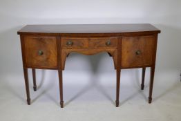 A C19th mahogany bowfront sideboard, with crossbanded top, single drawer and two cupboards, one