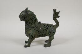 An Indo Persian pierced bronze lion censer, 7" long, 6½" high