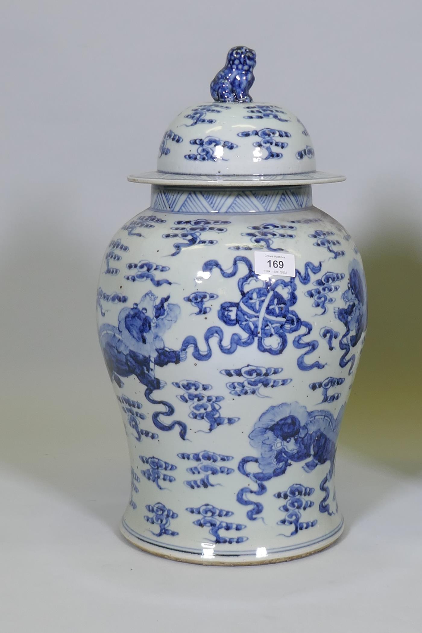 A pair of Chinese blue and white jars and covers with kylin decoration, 19" high - Image 4 of 6
