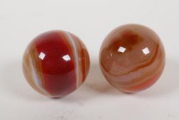 A pair of agate meditation balls, 1" diameter