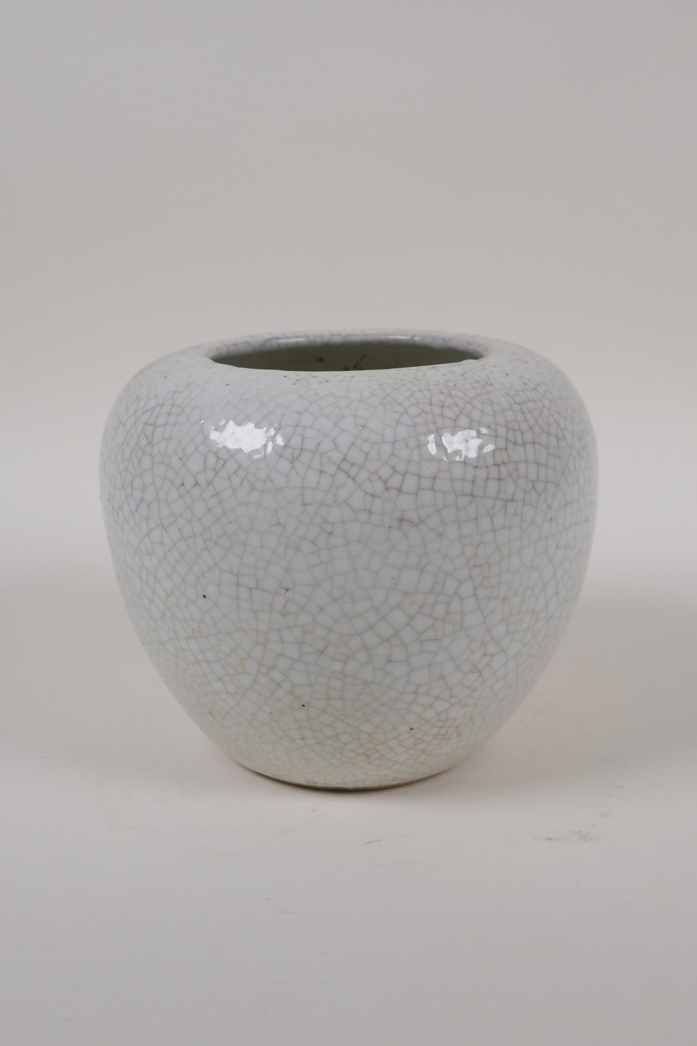 A Chinese cream crackleglazed porcelain jar, 5" high - Image 3 of 4