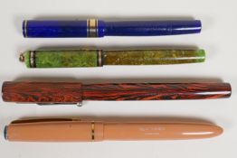 Four Mabie Todd fountain pens including a USA made Swan Self-Filler in a lapis lazuli effect case, a