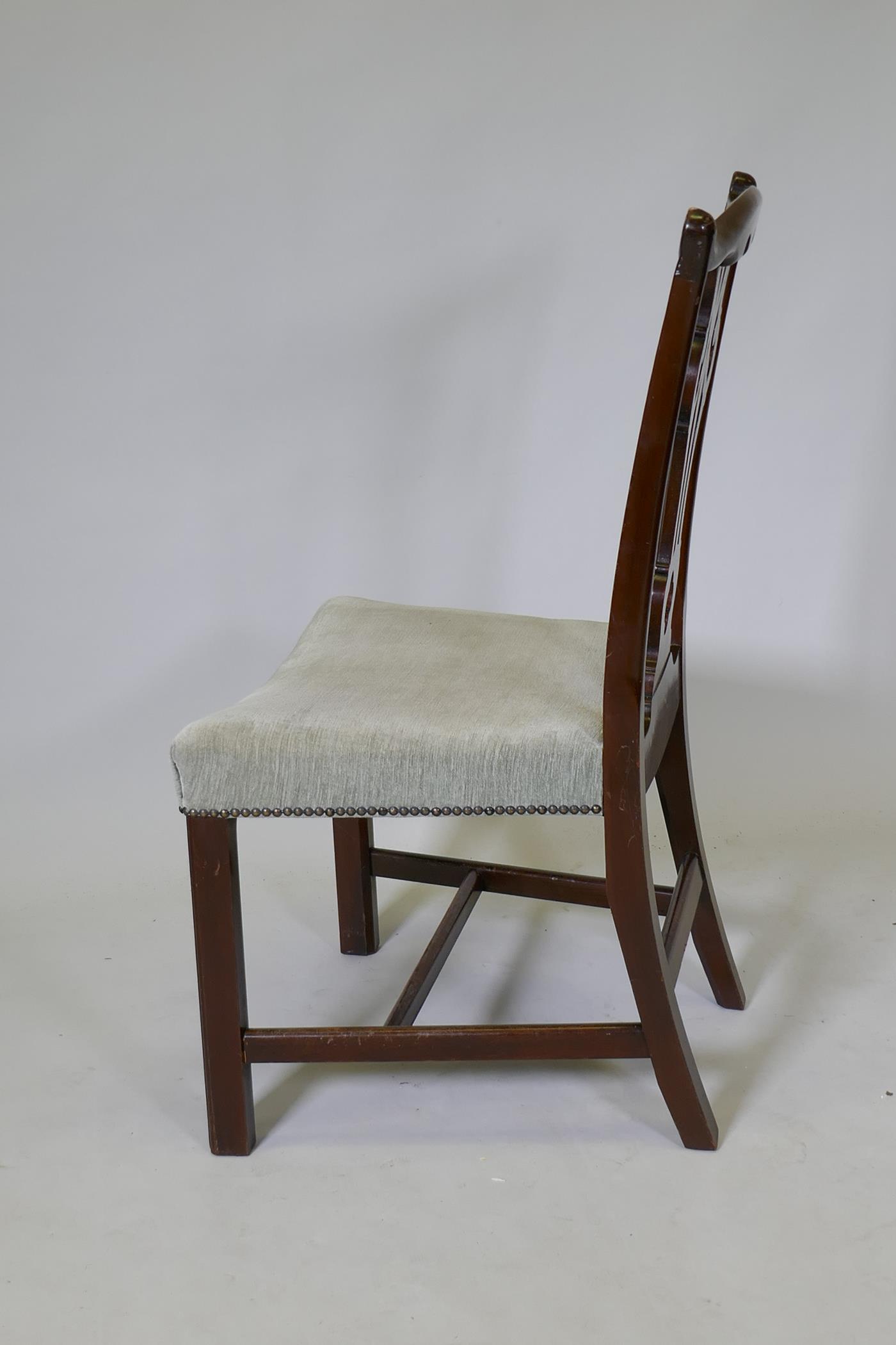 A set of six Chippendale style mahogany dining chairs with carved and pierced splats and overstuffed - Image 4 of 4