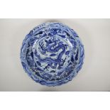 A Ming style blue and white porcelain charger with lobed rim and dragon decoration, Chinese 6