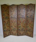 A C19th emobssed leather three fold screen with all over painted and parcel gilt decoration, each