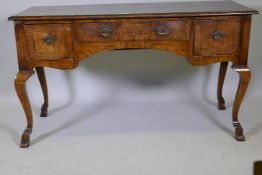 An C18th walnut side table with crossbanded top and three drawers with herringbone inlay and