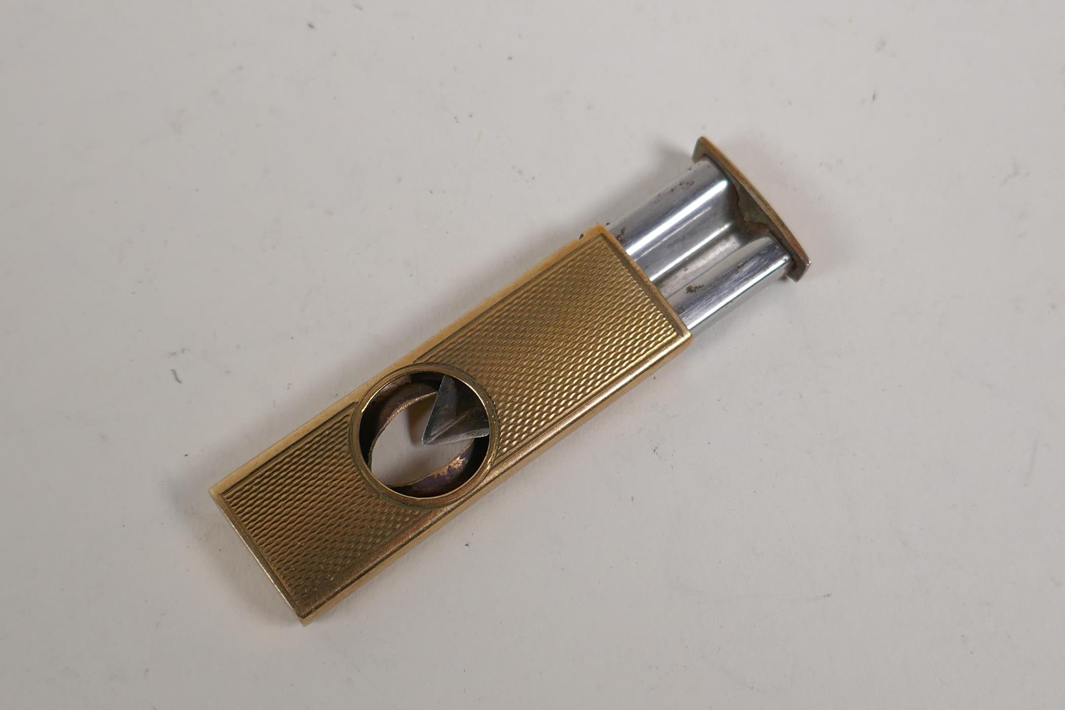 A 9ct gold cigar cutter by S.J. Rose & Son, 2" long, 12g gross - Image 3 of 4