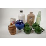 A quantity of stoneware items including hot water bottles, tobacco jar, jam barrel and a Codd's