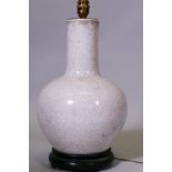 A vintage Chinese crackleglazed porcelain vase lamp, mounted on a wood base, 17" high