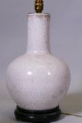 A vintage Chinese crackleglazed porcelain vase lamp, mounted on a wood base, 17" high
