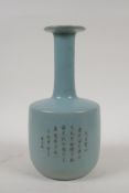 A Chinese Ru ware style vase with slender neck and character inscription to side, 10" high, AF