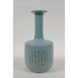 A Chinese Ru ware style vase with slender neck and character inscription to side, 10" high, AF