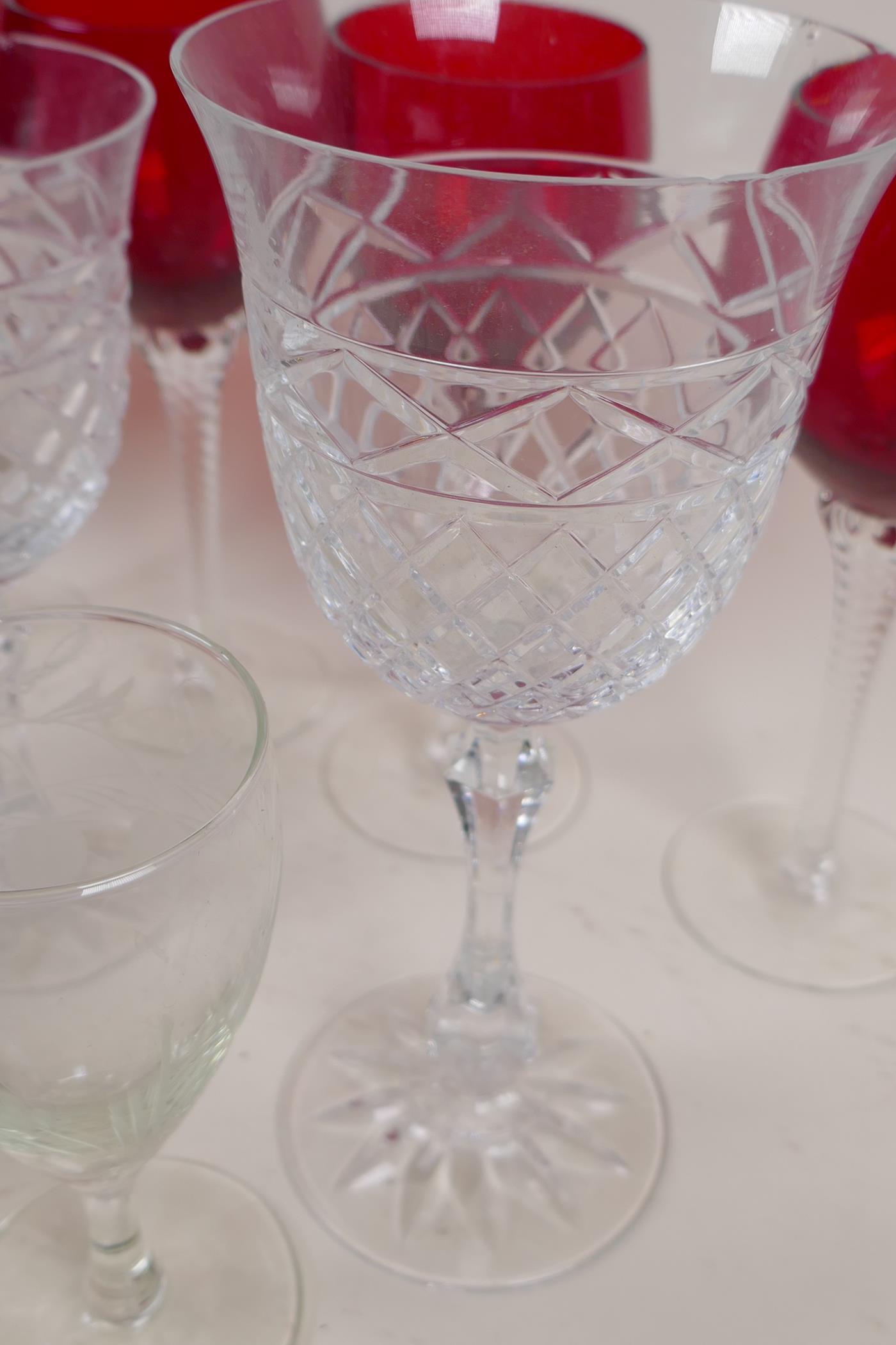 A quantity of wine glasses to include a set of five ruby on clear twist stems, Galway Goblets etc - Image 2 of 4