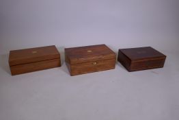 A Victorian brass inlaid walnut writing slope, together with two others in rosewood and mahogany,