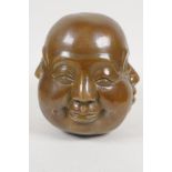 A bronze four faced Buddha head, 5" high