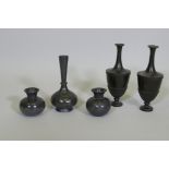 Three Bidri vases, with silver inlaid decoration of leaping fish, largest 6" high, and a pair of