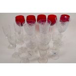 A quantity of wine glasses to include a set of five ruby on clear twist stems, Galway Goblets etc