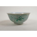 A Chinese green enamelled porcelain rice bowl with scrolling lotus flower decoration, Yongzheng 6