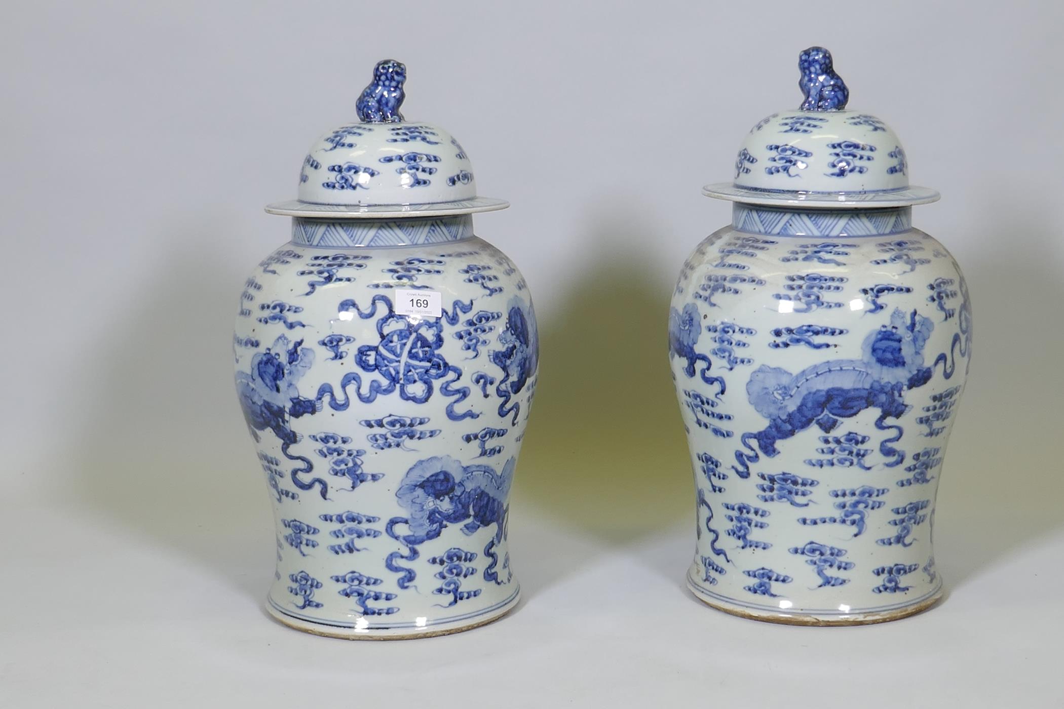 A pair of Chinese blue and white jars and covers with kylin decoration, 19" high - Image 2 of 6