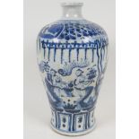 A Chinese blue and white porcelain vase decorated with figures on a crackle glaze, 10" high