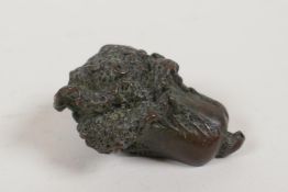 A Japanese bronze okimono incense stick holder in the form of an oriental cabbage, mark to base,