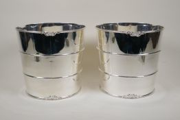 A pair of silver plated ice buckets with banded decoration, 8" diameter, 8" high