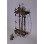 A vintage wall mounted wrought metal garden bracket, with night light holder, 34" x 15" x 6"