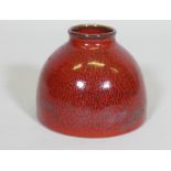 A Chinese ceramic pot with streaked red glaze, blue seal mark to base, 4½" high