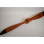 An ornamental wood propeller, 39" long