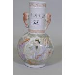 A Chinese Republic style famille vert ceramic vase, decorated with figures playing go, with