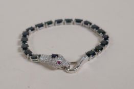 A 925 silver and sapphire bracelet with a snake head clasp encrusted with cubic zirconia, 6½" long