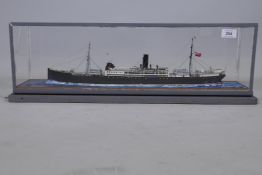 A scratch built model of a passenger ship, in a perspex case, 25" x 7" x 8"