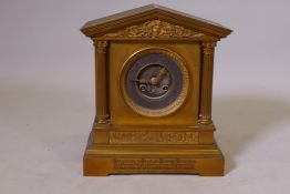 A C19th ormolu brass cased mantel clock with silvered chapter ring and Arabic numeral, the case with