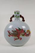 A Chinese crackle glazed porcelain two handled moon flask with red and green enamelled dragon