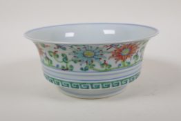 A Doucai porcelain bowl, decorated with a dragon and phoenix chasing the flaming pearl, Chinese