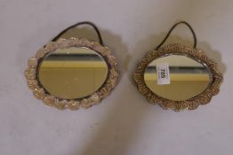 A pair of Turkish silver mirrors with repousse decoration, marked Tavra 900 6" x 5"