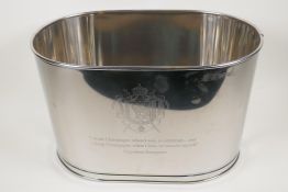 A plated oval wine cooler, engraved with aphorisms from Lilly Bollinger and Napolean Bonaparte,