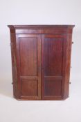 A Georgian oak corner cupboard with fitted interior, 37" x 20½", 43" high