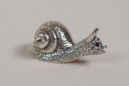 A miniature sterling silver box and cover in the form of a snail, 1" long