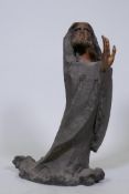 An oriental patinated bronze figure of an immortal, 21" high