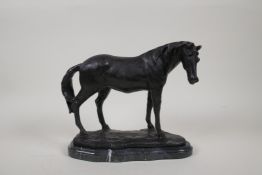 A bronze figure of a horse, on a marble base, 8½" high, 10" long