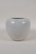 A Chinese cream crackleglazed porcelain jar, 5" high