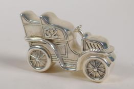 A silver plated vesta case in the form of a vintage car, 2½" long