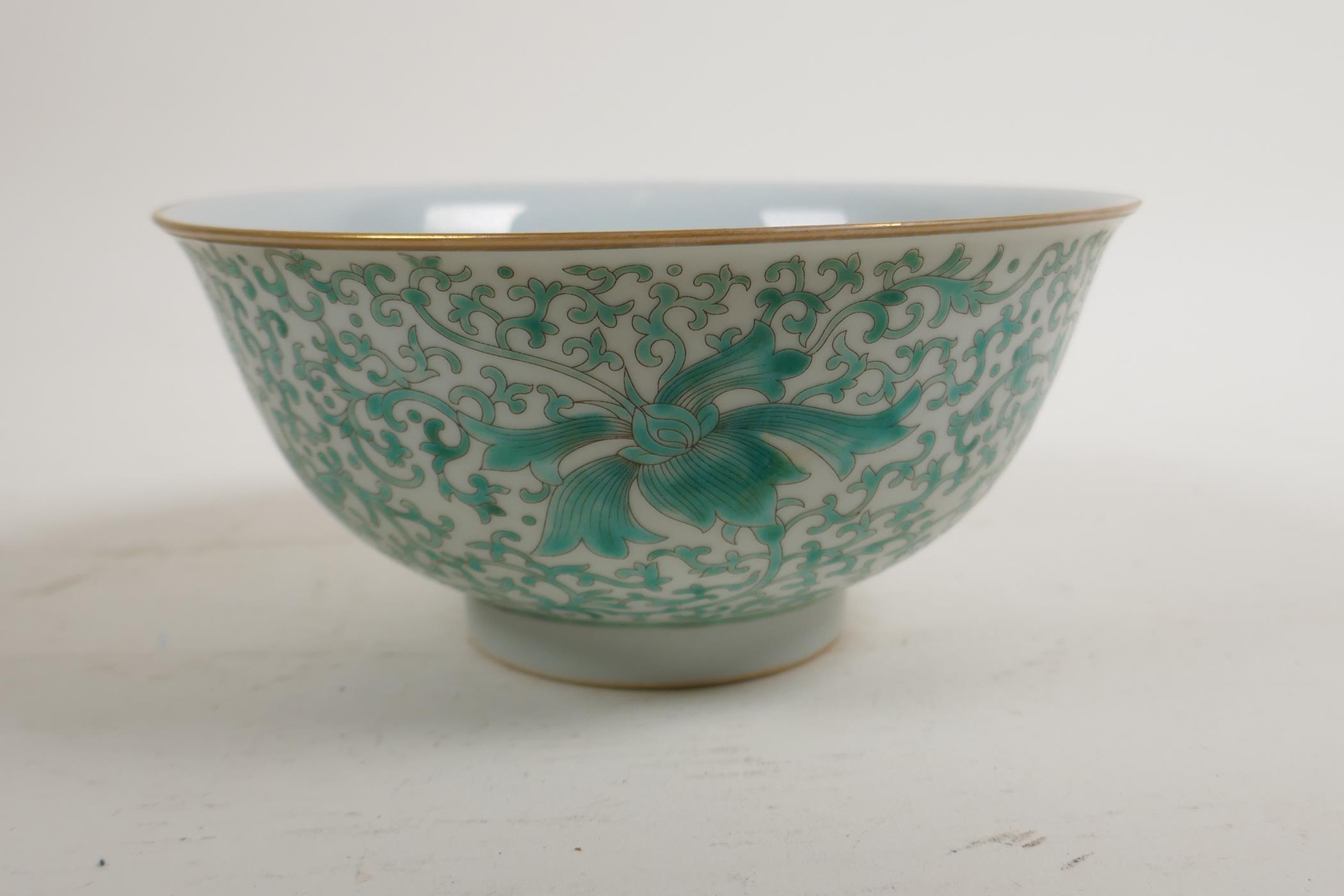 A Chinese green enamelled porcelain rice bowl with scrolling lotus flower decoration, Yongzheng 6 - Image 3 of 5