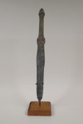 A Chinese bronze archaic style dagger, on a display stand, 16" long